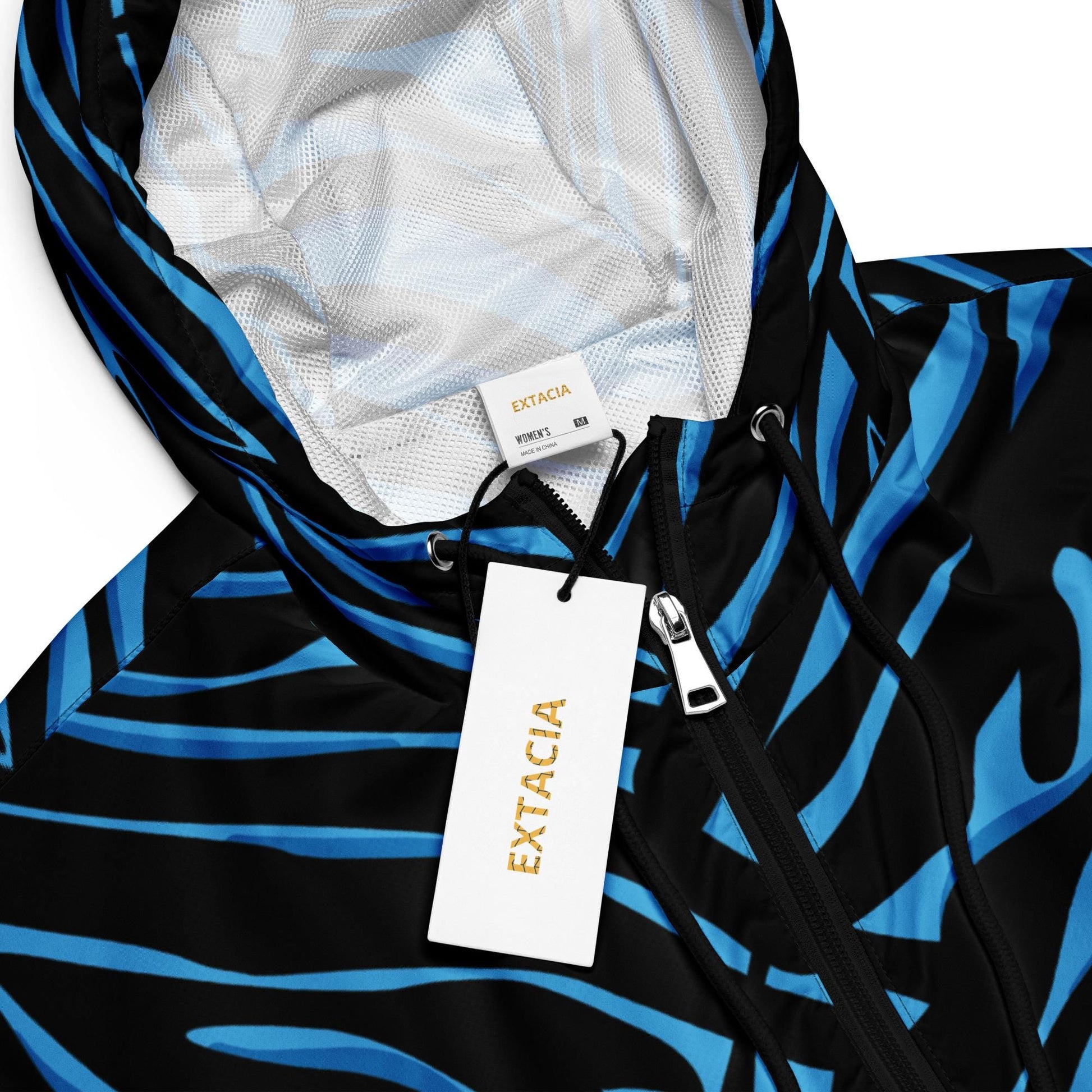 Capuche et fermeture, veste coupe-vent femme bleu et noir, pour sport et ville