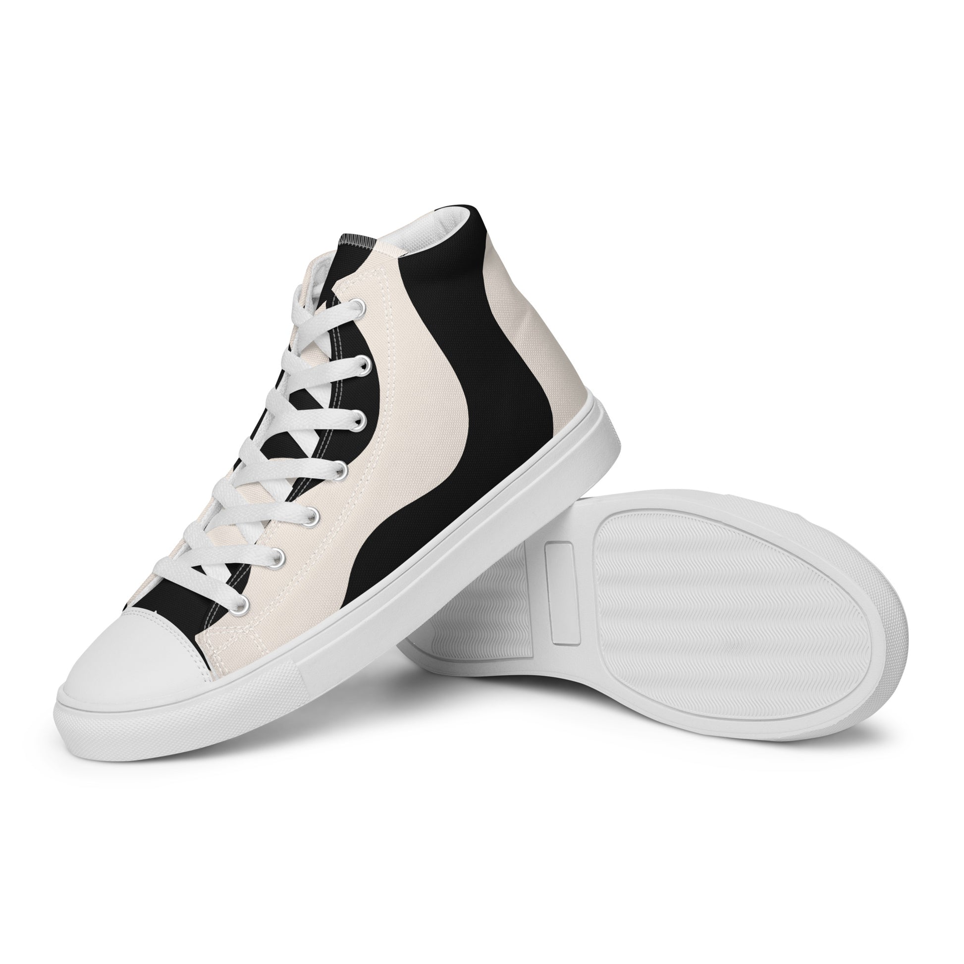 Détail de la semelle extérieure adhérente et coutures de tige - beige et noir, graphique - semelle blanche