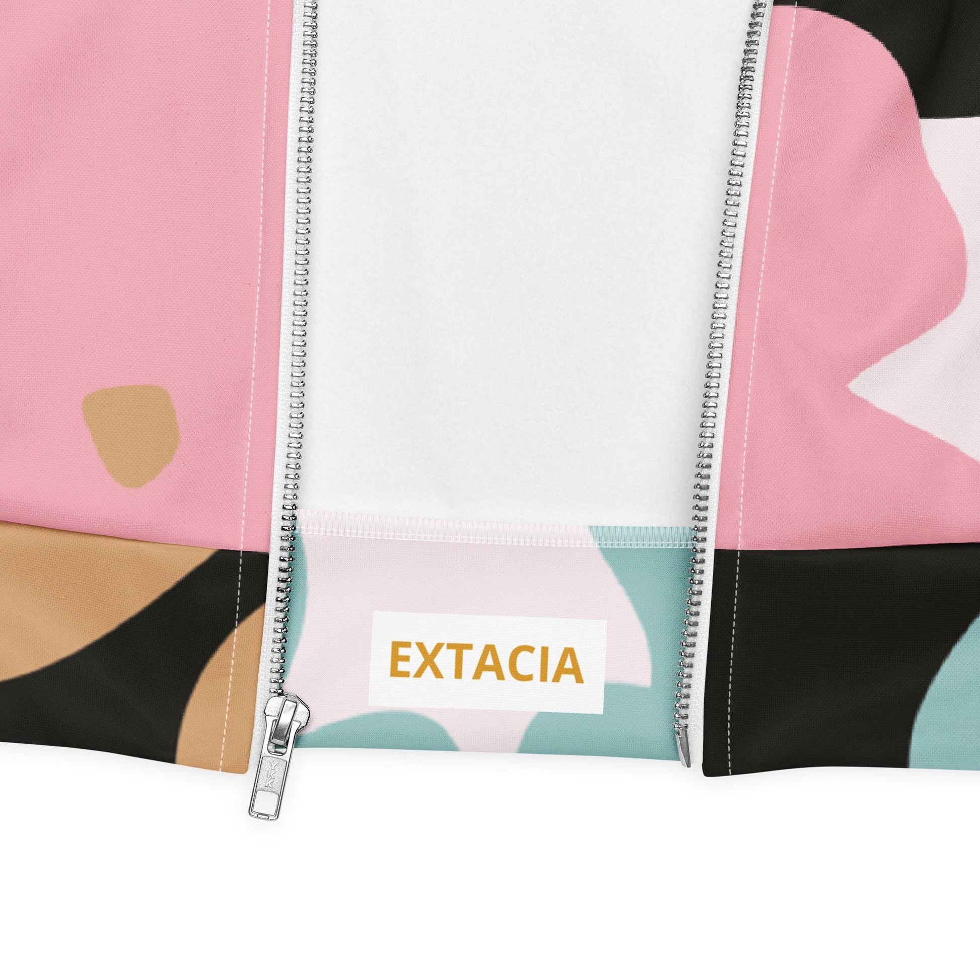 Détail du zip et des coutures, tissu technique léger et respirant