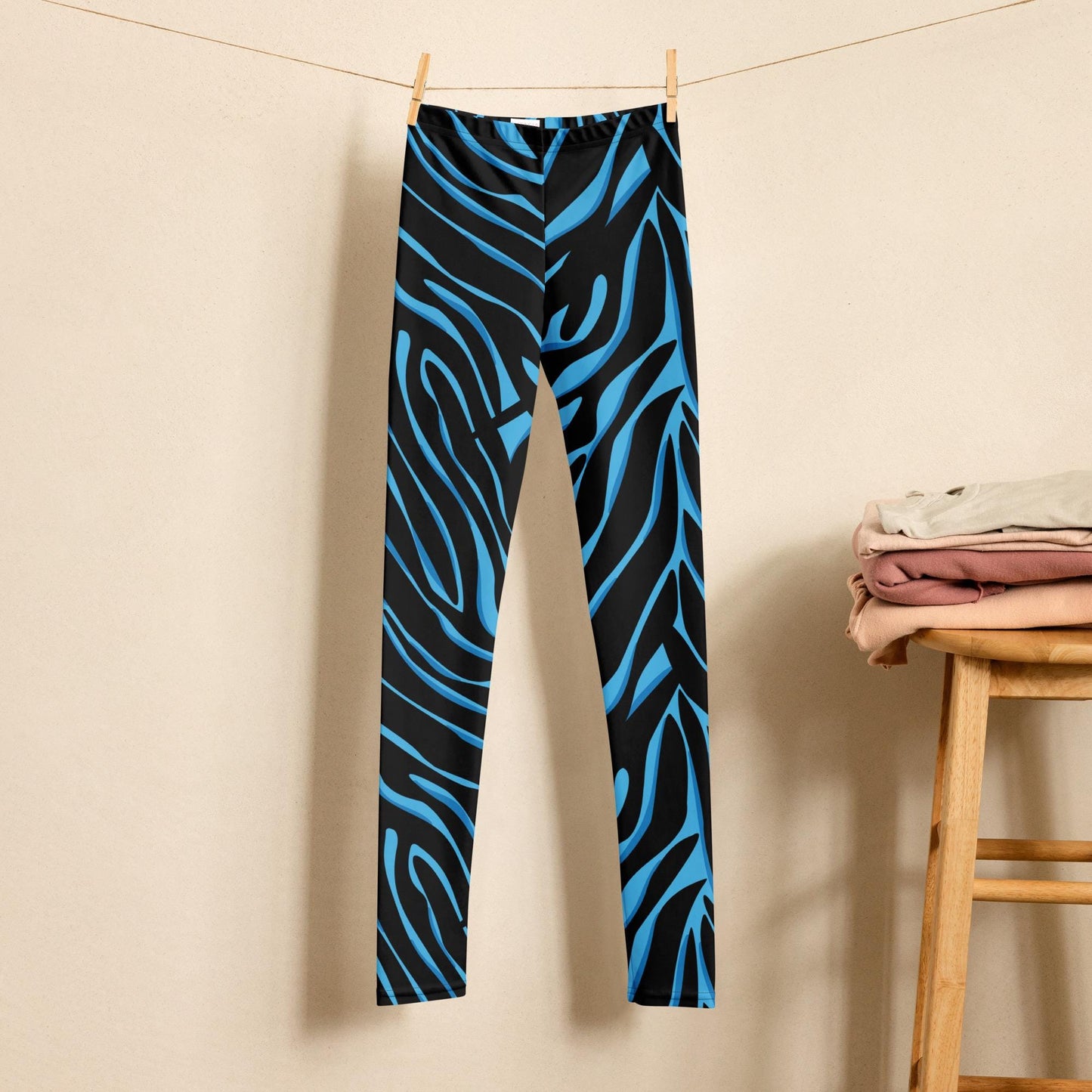 Legging fille ado -bleu et noir imprimé animal minimaliste – Détail matière extensible et séchage rapide