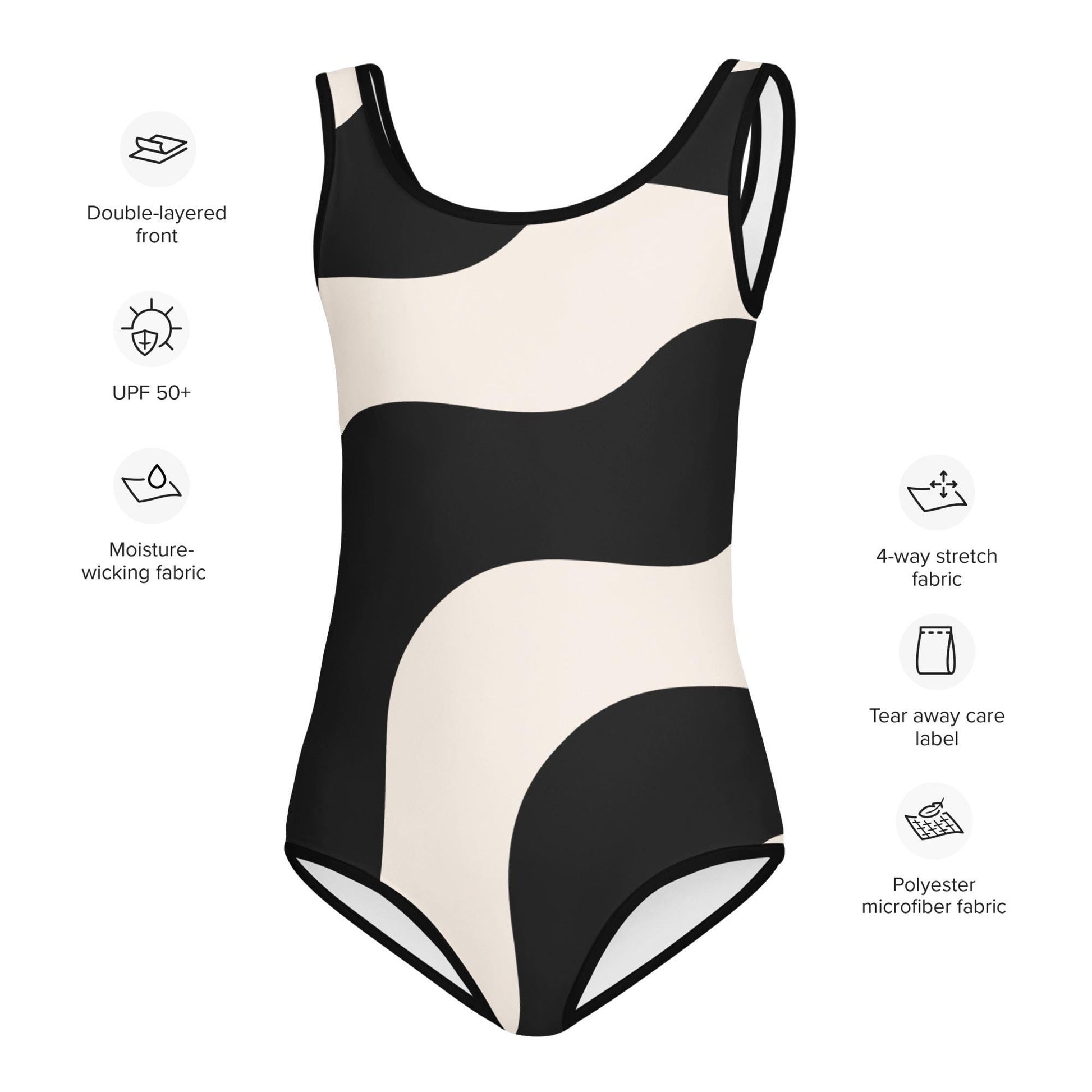 Maillot de bain enfant - beige et noir à ondulations, graphique, minimaliste – 	Détail matière extensible et séchage rapide