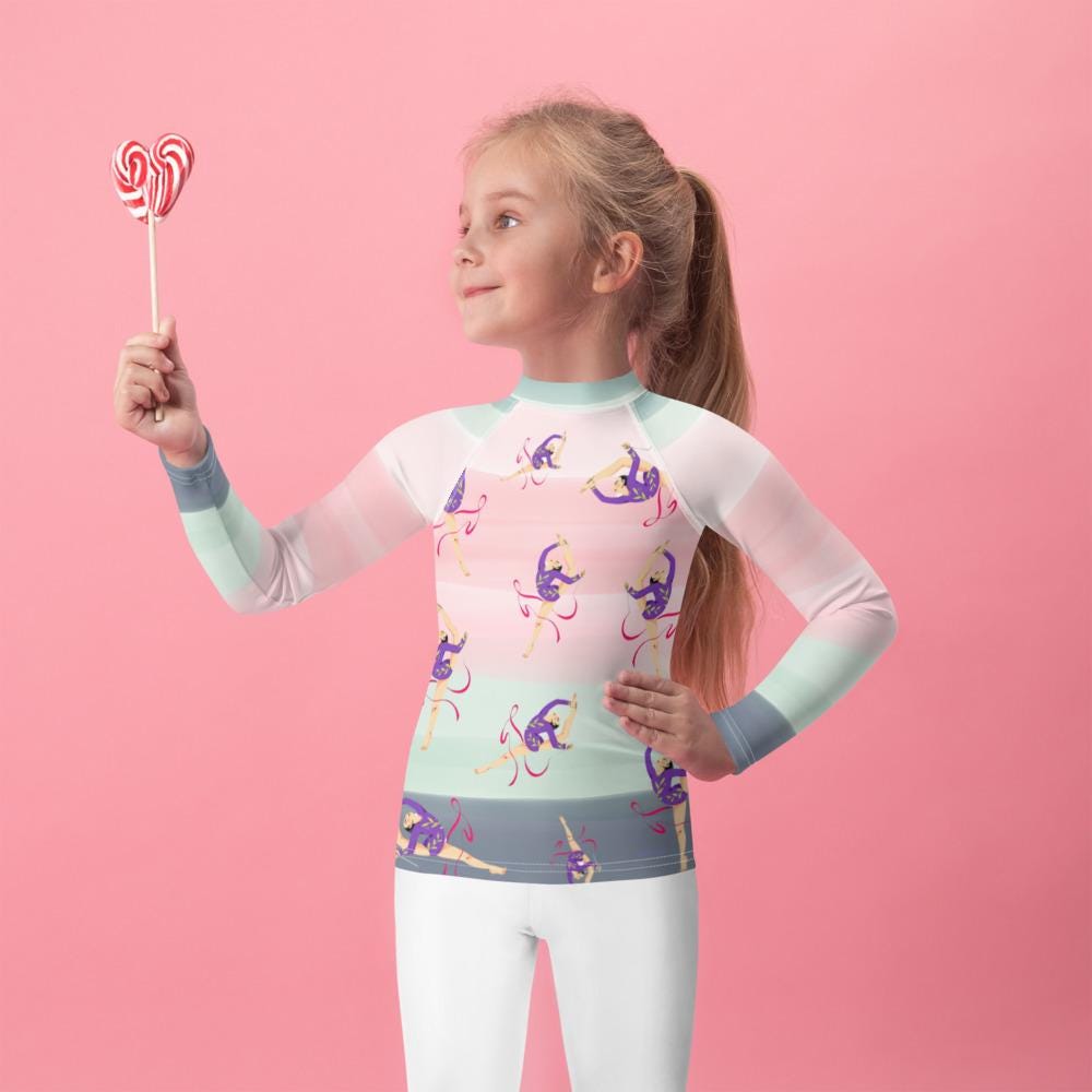 Rash guard petite fille – dégradé rose kaki, motif gymnaste danseuse - vue de face, compression légère