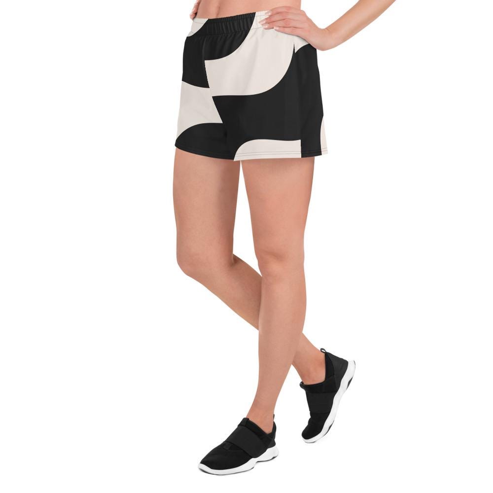 Short de sport femme en polyester recyclé - beige et noir à ondulations  – profil, taille élastiquée, liberté de mouvement