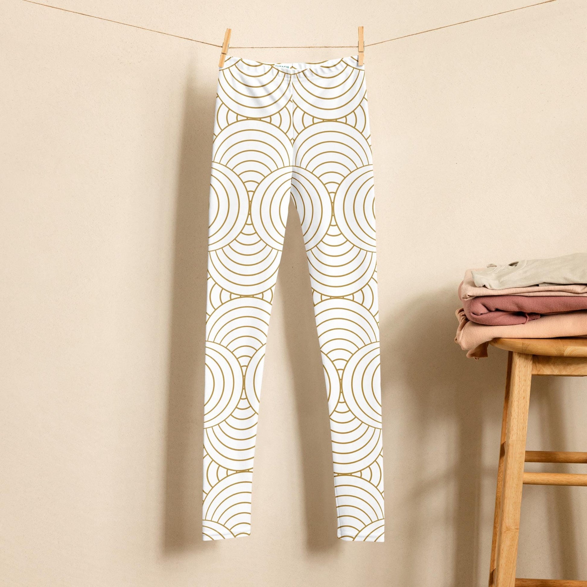 Legging fille ado - blanc et or à spirales, graphique, minimaliste – Détail matière extensible et séchage rapide