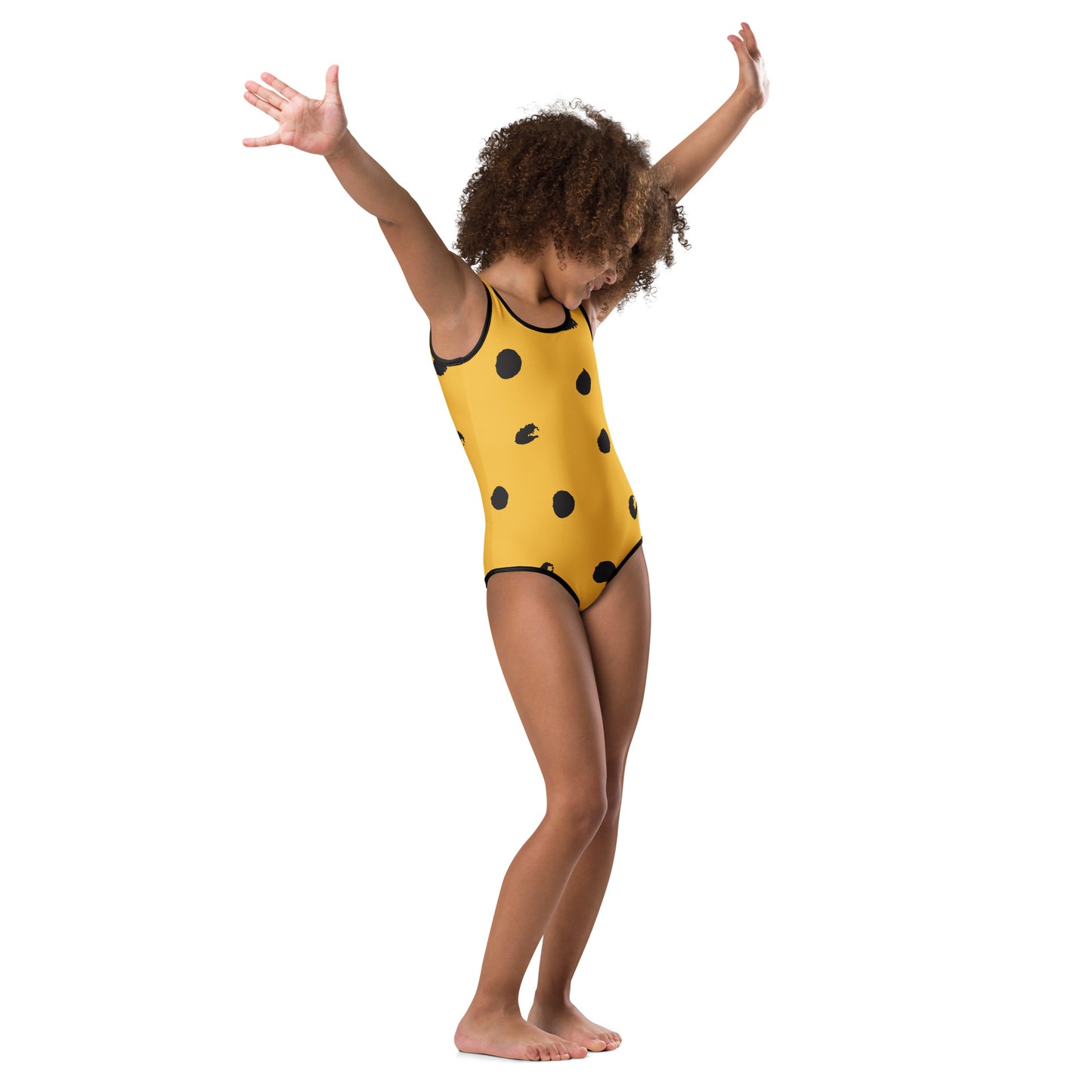 Maillot de bain enfant - jaune et noir à tacheté, imprimé animal, minimaliste – vue de profil, aisance en mouvement